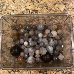 Approximately 90 assorted spheres